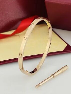 Rose Gold-Tone Screw Accent Bangle Bracelet
